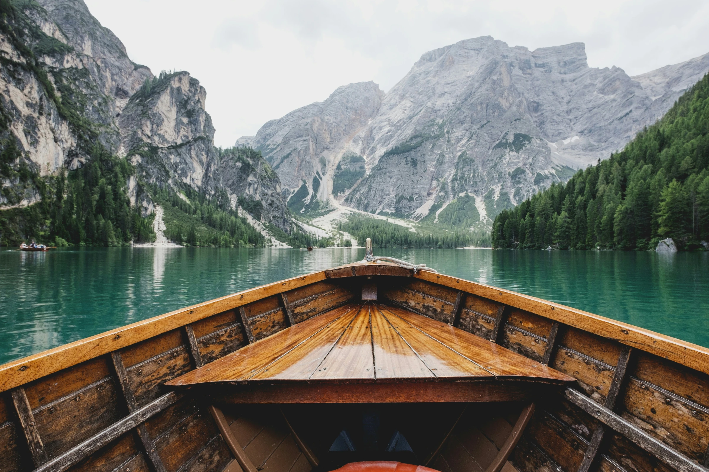 View from a wooden boat on a mountain lake